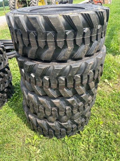(4) new 12 ply 12-16.5 skid steer tires