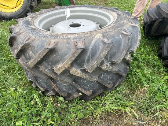 (2) new 8 ply 11.2-24 tires on 6 bolt rims - bid x 2