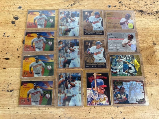 14 assorted Albert Belle sports cards in sleeves