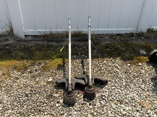 pair of Milwaukee straight shaft string trimmer attachments