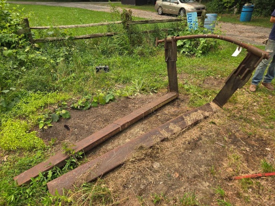 Over bucket pallet forks with 9 ft extensions