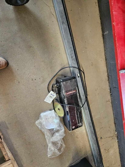 Rollup garage door opener