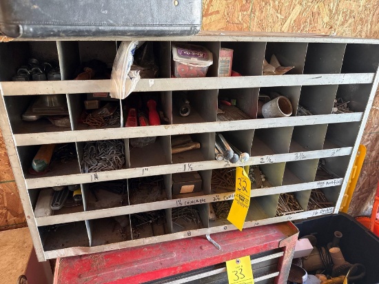 hardware organizer loaded with nails, bolts, staples, misc