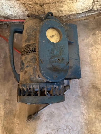 Tote of Extension Cords and Vacuum Pump