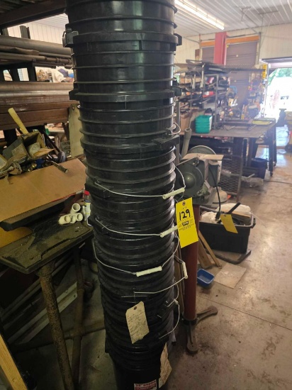 Stack Of Black 5 Gal Buckets