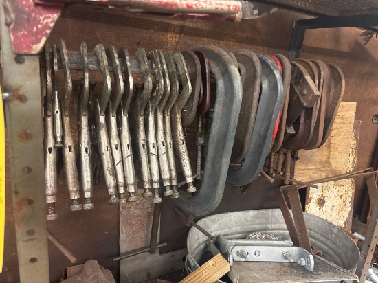 Contents of Workbench: scrap metal, vises, pipe vise, and more