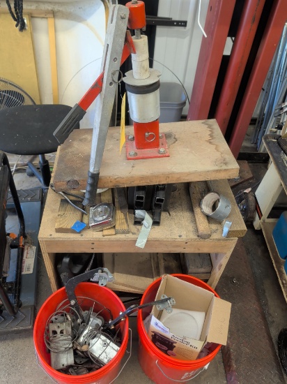 Mini tire changer on homemade wood stand and contents