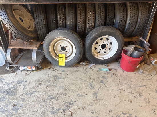 Contents under the bench, boat tires, anchor, press, weights