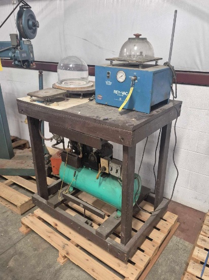 Rey-Vac No. 160-025 Vacuum Caster on Stand