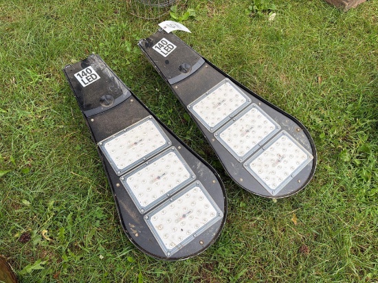 (2) LED parking lot lights