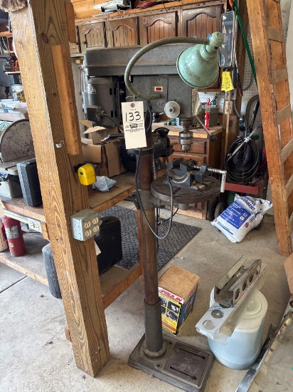 Universal floor model drill press with machines vice