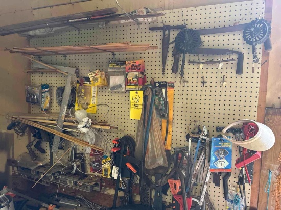 wall contents, tools, contents underneath bench, hand tools
