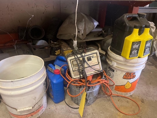 Assorted fluids, battery charger, pipe fittings, ect