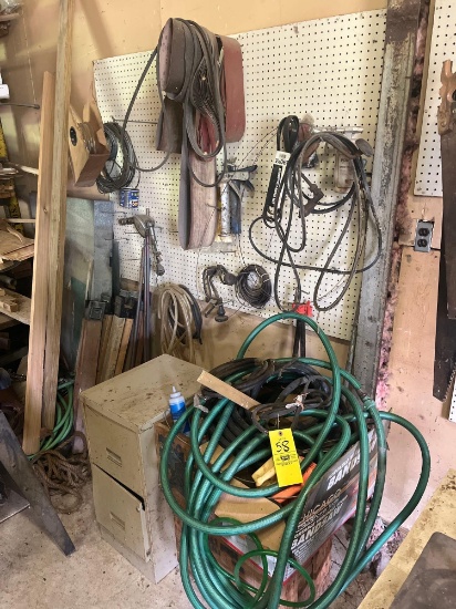 sanding belts, garden hose, saw horses, file cabinet, contents