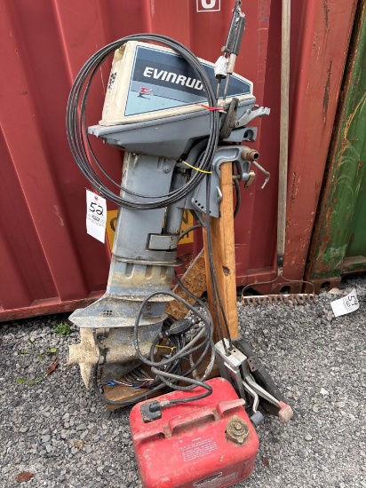 Evinrude 9.9 HP outboard motor with controls and gas tank