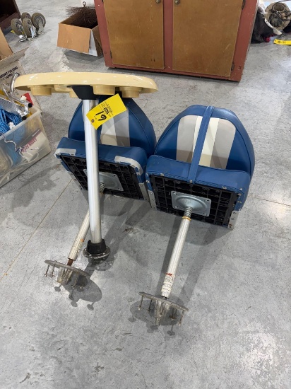 2-boat seats with bases and table