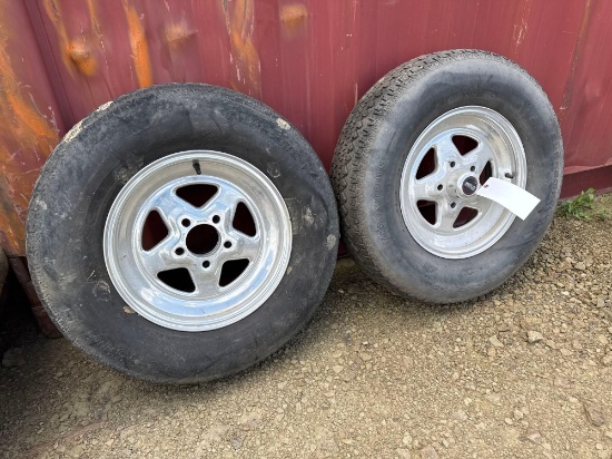 pair P225/75R15 tires on rims