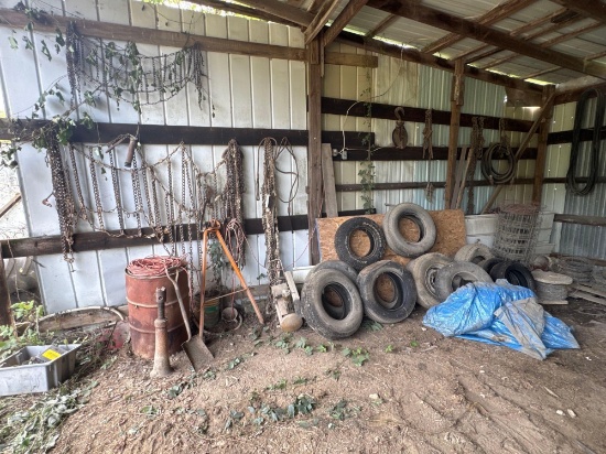 Tire chains - tires - iron - woven wire - barb wire - chain binders along wall