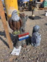 Eagle and squirrel statues