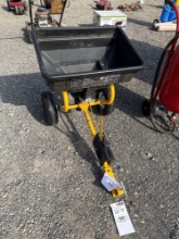 Pull behind spreader