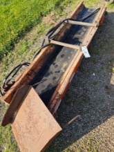Dump truck tailgate conveyor
