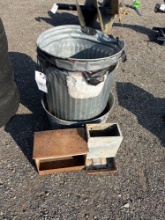Trash cans and chicken feeder