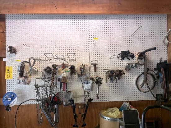 Wall Contents, Assortment of Chains, Grease Guns, mouse traps, clamps, hose clamps, Hangers etc.