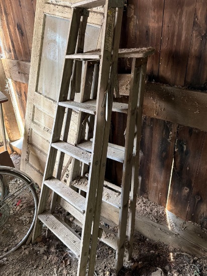 pair of wood step ladders