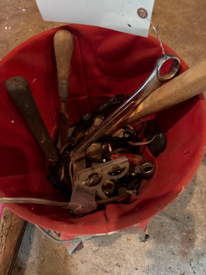 tool bucket loaded with tools, single tree