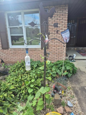 2 Shepards Hooks, Damaged Watermelon Boy Statuette, & Small Mulch Bed Decor