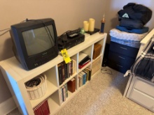 divided shelf, books, air mattress, TV and VCR, DVD player, computer bags,