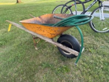 Metal wheel barrel And hose