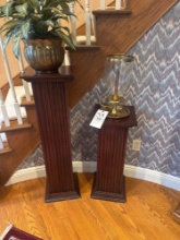 Pair of wood column stands and vases
