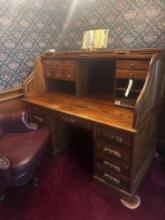 Winners Only 5' Oak Roll-top desk with executive chair.