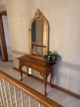 oak foyer stand and gold frame mirror
