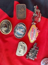 (7) assorted belt buckles