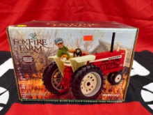 ERTL collectibles Porcelain figurine with die cast Farmall 1206
