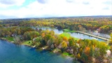 Wooded Golf Course Property Near Lakes in Canadian Lakes, Mecosta County, Michigan!