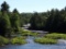 Over 17 Acres with 1,400 Foot River Frontage in Michigan's Eastern Upper Peninsula!