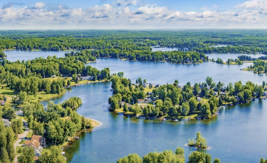 Build Your Dream Home in Thriving Canadian Lakes, Michigan!