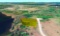Cheboygan County, MI Living: Ideal Property Between a Serene Lake and a Golf Course!