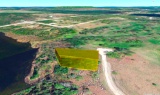Cheboygan County, MI Living: Ideal Property Between a Serene Lake and a Golf Course!