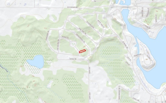 Canadian Lakes, Michigan: Build Your Private Home on this Half-Acre!