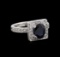 1.68 ctw Sapphire and Diamond Ring - 14KT White Gold