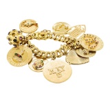 Charm Bracelet with Ten Attached Charms - 14KT Yellow Gold