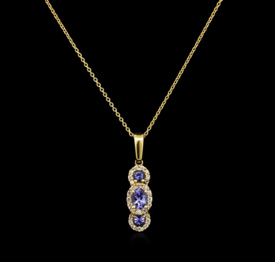 0.56 ctw Tanzanite and Diamond Pendant With Chain - 14KT Yellow Gold