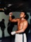 Muhammad Ali Training on Speedbag - Color Print