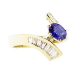1.64 ctw Sapphire And Diamond Ring - 14KT Yellow Gold