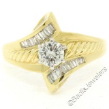 18kt Yellow and White Gold 0.90 ctw Round and Baguette Diamond Ring
