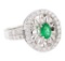 1.16 ctw Oval Mixed Emerald And Round Brilliant Cut Diamond Ring - 14KT White Go